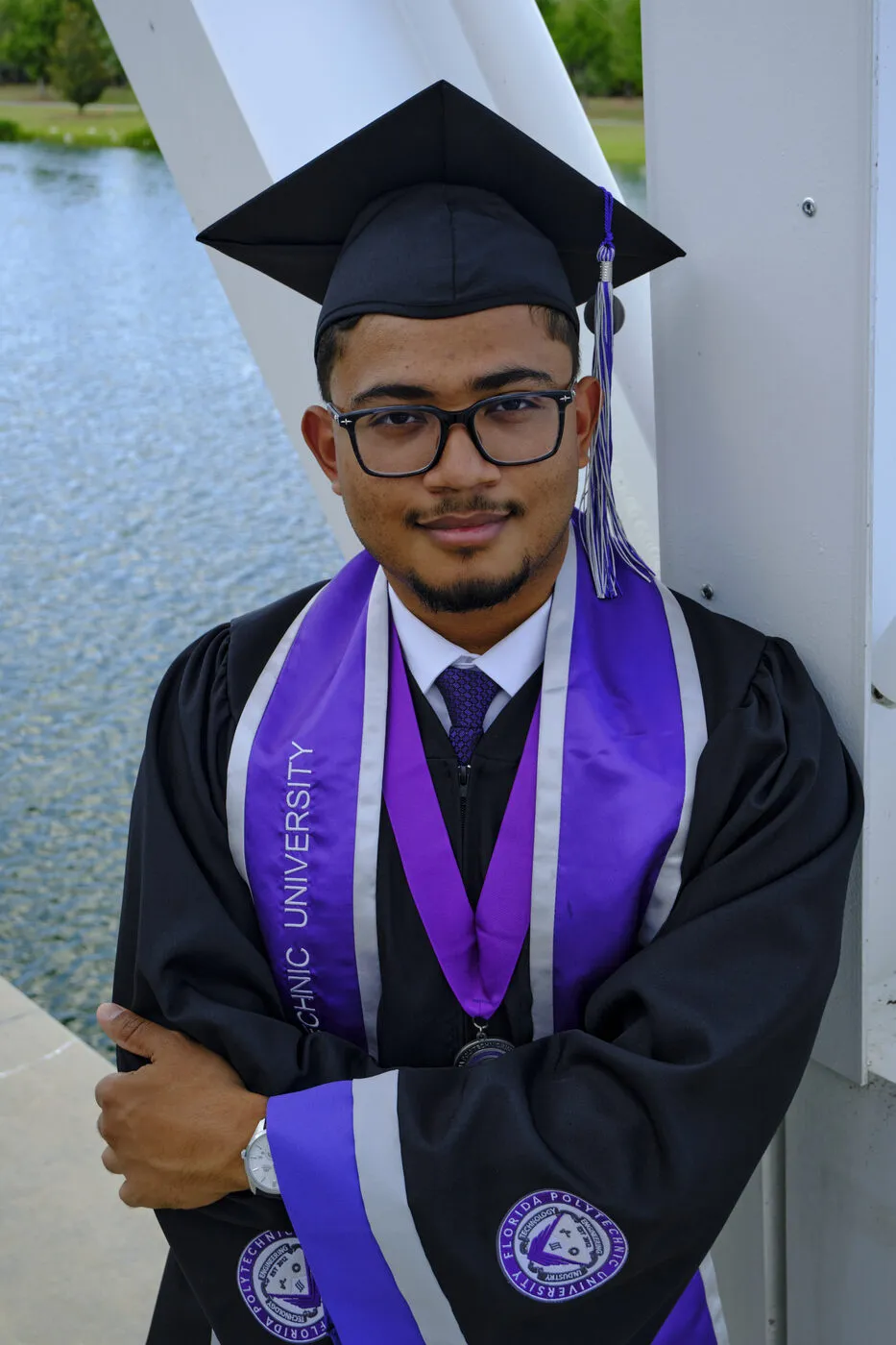 Jacob Diaz-Iglesias, founder of Porchlight Tech, smiling in his graduation cap and gown.